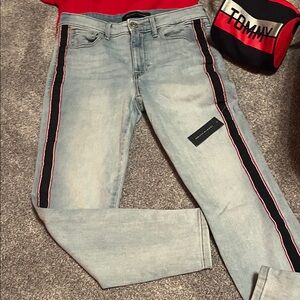 Tommy Hilfiger Light Blue Denim with Red and navy striped on side of jeans